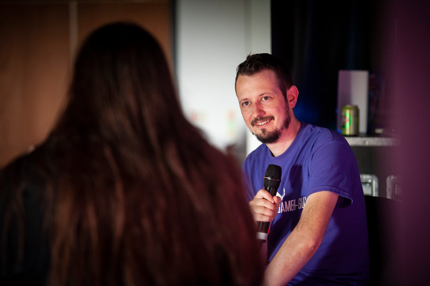 Middle Aged Gamer Guy Interviewing at a Games Con